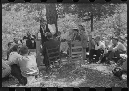 Preacher, relatives and friends of the deceased at a memorial meeting near Jackson, Breathitt County, Kentucky