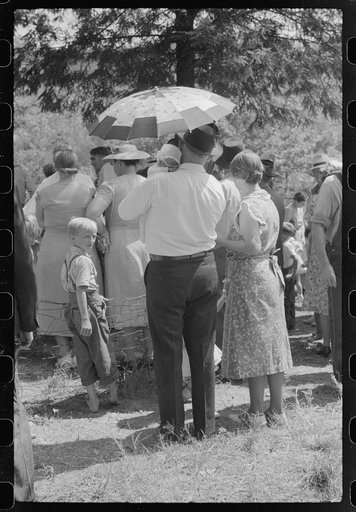 Mountain people leaving the Primitive Baptist Church in Morehead, Kentucky, and going down to the creek for a baptizing