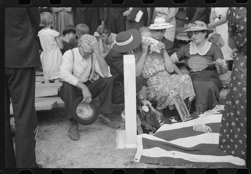 Mother and relatives weeping at the grave of the deceased at memorial meeting near Jackson, Kentucky, Breathitt County. See general caption no. 1