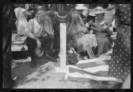 Untitled photo, possibly related to: Mother and relatives weeping at the grave of the deceased at memorial meeting near Jackson, Kentucky, Breathitt County. See general caption no. 1