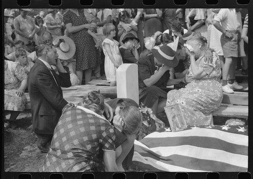 Untitled photo, possibly related to: Mother and relatives weeping at the grave of the deceased at memorial meeting near Jackson, Kentucky, Breathitt County. See general caption no. 1