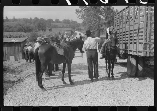 Untitled photo, possibly related to: Farmers trading mules and horses on "Jockey Street" in Campton, Kentucky