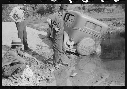 Untitled photo, possibly related to: Mountaineers trying to get car out of creek. Up South fork of the Kentucky River, Breathitt County, Kentucky