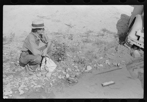 Untitled photo, possibly related to: Mountaineers trying to get car out of creek. Up South fork of the Kentucky River, Breathitt County, Kentucky