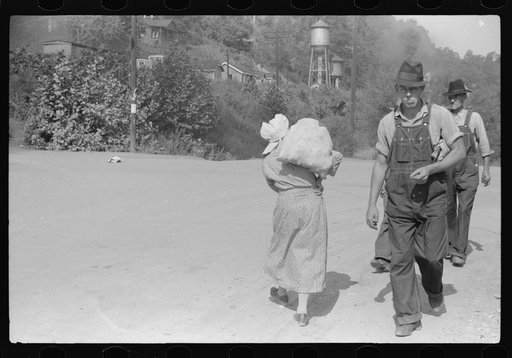 Mountain woman carrying home supplies, Jackson, Breathitt County, Kentucky