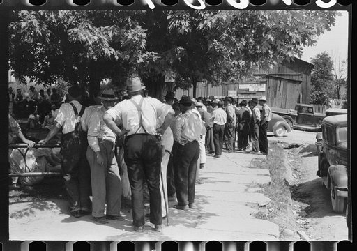Untitled photo, possibly related to: Mountaineers and farmers exchange news near courthouse on court day. Campton, Wolfe County, Kentucky