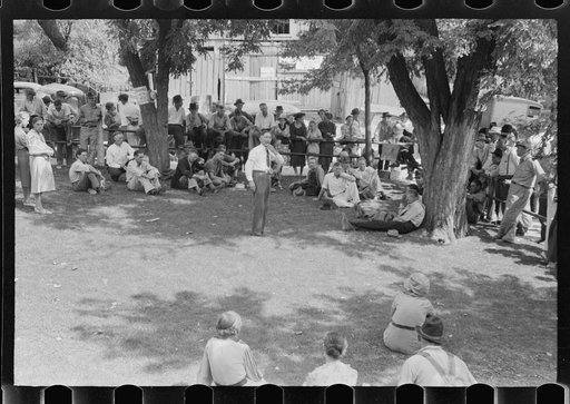 Untitled photo, possibly related to: Community people listening to itinerant preacher in courtyard on court day, Campton, Kentucky