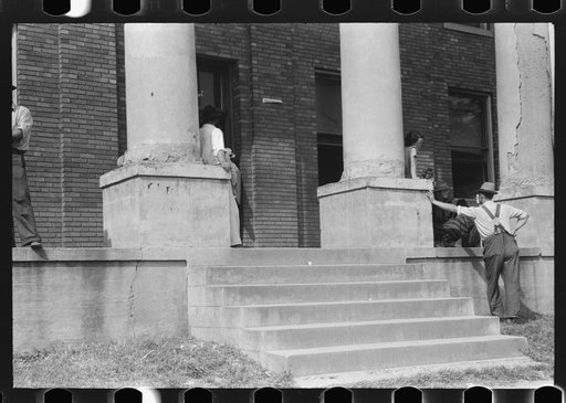 Untitled photo, possibly related to: Farmers and townspeople in front of courthouse on court day, in Campton, Kentucky