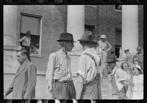 Untitled photo, possibly related to: Farmers and townspeople in front of courthouse on court day, in Campton, Kentucky