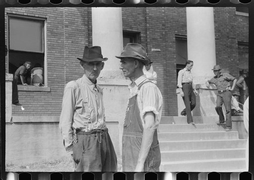 Untitled photo, possibly related to: Farmers and townspeople in front of courthouse on court day, in Campton, Kentucky