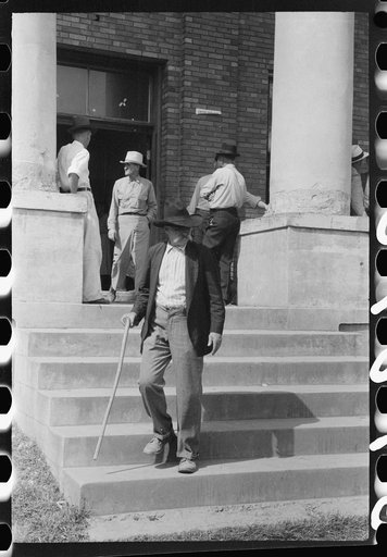 Farmers and townspeople in front of courthouse on court day, in Campton, Kentucky