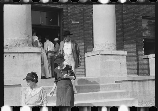 Farmers and townspeople in front of courthouse on court day, in Campton, Kentucky