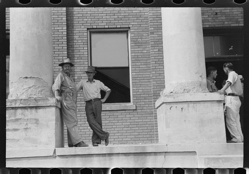Farmers and townspeople in front of courthouse on court day, in Campton, Kentucky