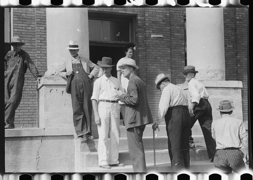 Untitled photo, possibly related to: Farmers and townspeople in front of courthouse on court day, in Campton, Kentucky