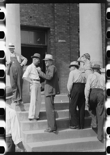 Untitled photo, possibly related to: Farmers and townspeople in front of courthouse on court day, in Campton, Kentucky
