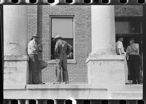 Untitled photo, possibly related to: Farmers and townspeople in front of courthouse on court day, in Campton, Kentucky