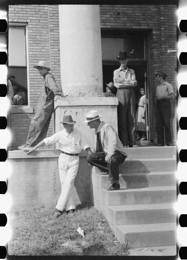 Untitled photo, possibly related to: Farmers and townspeople in front of courthouse on court day in Campton, Kentucky