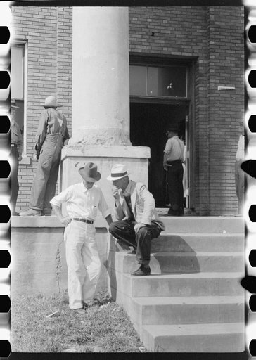 Farmers and townspeople in front of courthouse on court day in Campton, Kentucky