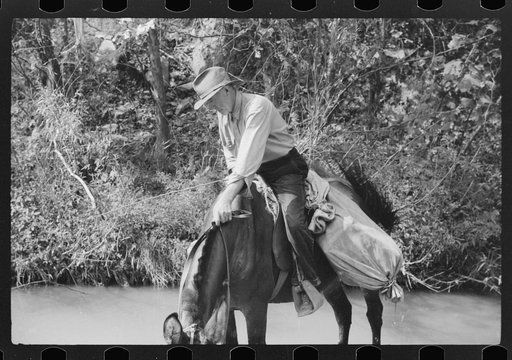 Rural mailman going up the creek bed toward Morris Fork near Jackson, Kentucky