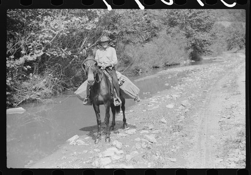 Untitled photo, possibly related to: Rural mailman going up the creek bed toward Morris Fork near Jackson, Kentucky