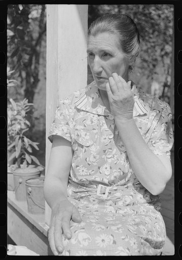 Mountain woman on porch near Burton's Fork, Kentucky River, near Jackson, Kentucky