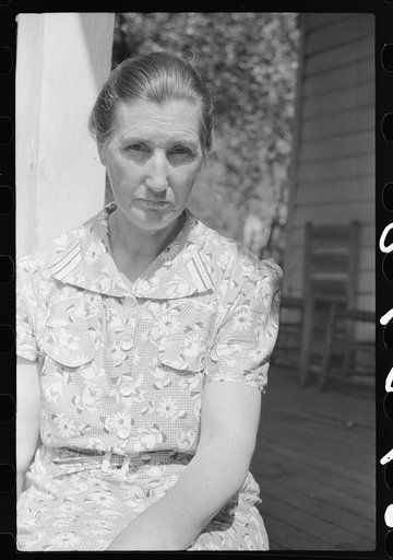 Untitled photo, possibly related to: Mountain woman on porch near Burton's Fork, Kentucky River, near Jackson, Kentucky