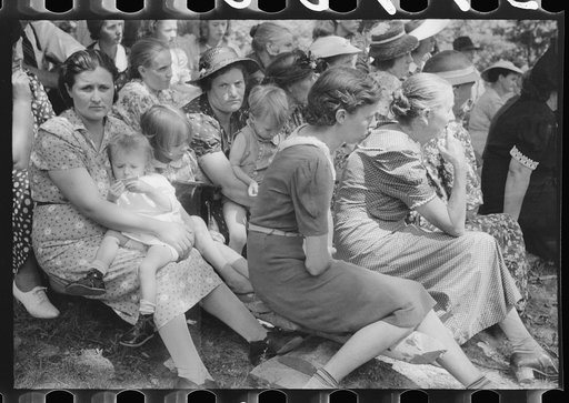 Friends of the deceased's family at an annual memorial meeting in the family cemetery. In the mountains near Jackson, Kentucky. See general caption no. 1