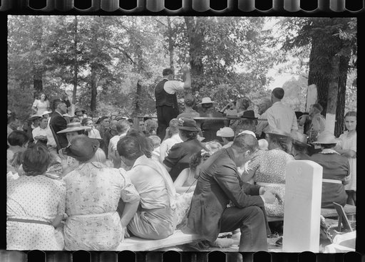 Untitled photo, possibly related to: Preacher, relatives and friends of the deceased at a memorial meeting near Jacson, Breathitt County, Kentucky. See general caption no. 1