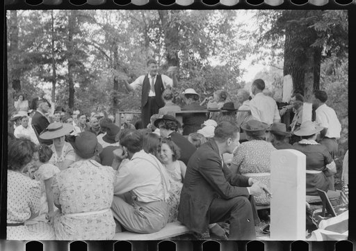 Untitled photo, possibly related to: Preacher, relatives and friends of the deceased at a memorial meeting near Jacson, Breathitt County, Kentucky. See general caption no. 1
