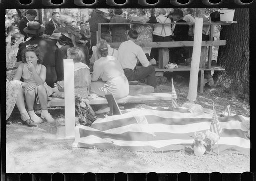Untitled photo, possibly related to: Grave decorated for a memorial meeting held annually for the deceased of each family, particularly in the summer and early fall when relatives can come from other communitites and states. Near Jackson, Breathitt County, Kentucky. See general caption no. 1