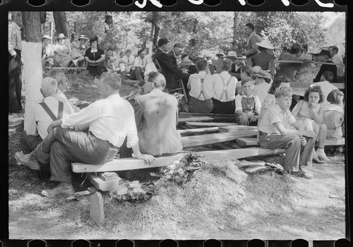 Untitled photo, possibly related to: Preacher, relatives and friends of the deceased at a memorial meeting near Jacson, Breathitt County, Kentucky. See general caption no. 1