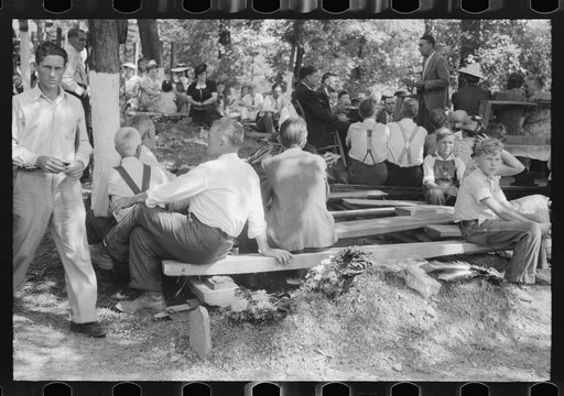 Untitled photo, possibly related to: Preacher, relatives and friends of the deceased at a memorial meeting near Jacson, Breathitt County, Kentucky. See general caption no. 1