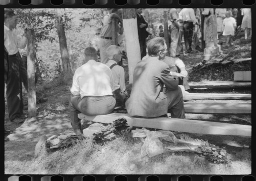 Untitled photo, possibly related to: Preacher, relatives and friends of the deceased at a memorial meeting near Jacson, Breathitt County, Kentucky. See general caption no. 1