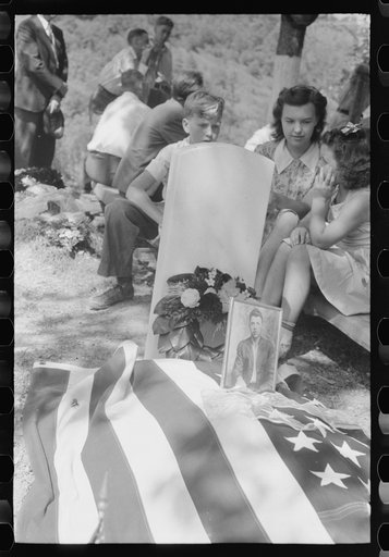 Grave decorated for a memorial meeting held annually for the deceased of each family, particularly in the summer and early fall when relatives can come from other communitites and states. Near Jackson, Breathitt County, Kentucky. See general caption no. 1