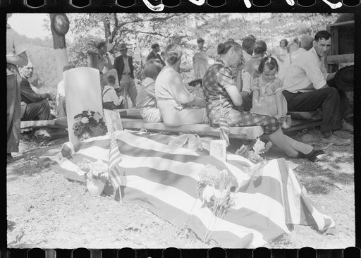 Untitled photo, possibly related to: Grave decorated for a memorial meeting held annually for the deceased of each family, particularly in the summer and early fall when relatives can come from other communitites and states. Near Jackson, Breathitt County, Kentucky. See general caption no. 1