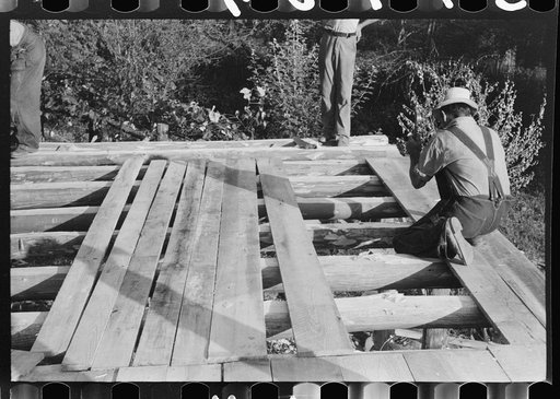 Untitled photo, possibly related to: Mountaineer laying the new floor in his neighbor's home near Jackson, Breathitt County, Kentucky