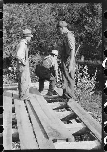 Untitled photo, possibly related to: Mountaineer laying the new floor in his neighbor's home near Jackson, Breathitt County, Kentucky