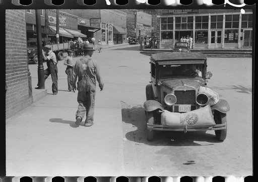 Farmer's car loaded with sacks of feed. Saturday morning, Jackson, Kentucky