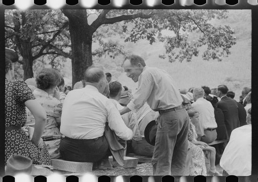 Untitled photo, possibly related to: Preacher, relatives and friends of the deceased at a memorial meeting near Jackson, Breathitt County, Kentucky. See general caption no. 1