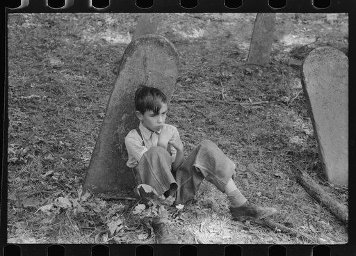 Son of one of the deceased's family at an annual memorial meeting in the family cemetery. In the mountains near Jackson, Kentucky. See general caption no. 1