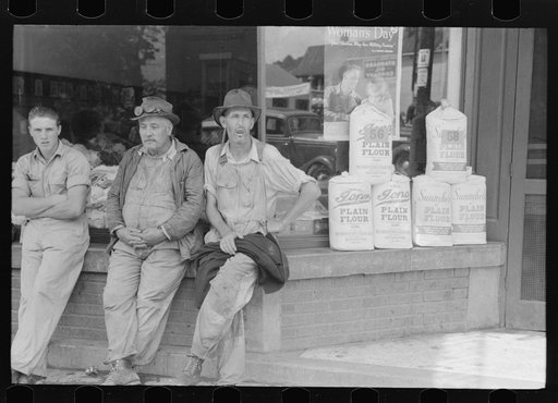 Farmers hanging in front of stores on Saturday, Jackson, Kentucky