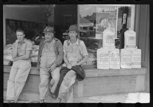 Untitled photo, possibly related to: Farmers hanging in front of stores on Saturday, Jackson, Kentucky