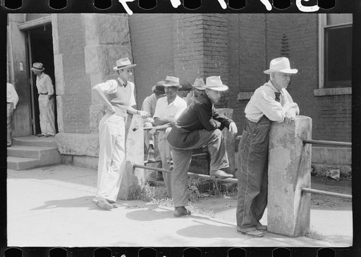 Farmers hang around in front of stores on Saturday, Jackson, Kentucky