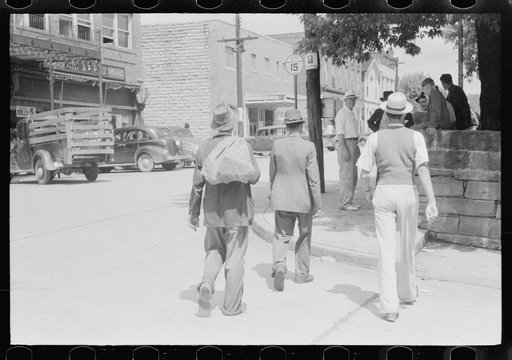 Untitled photo, possibly related to: Farmers hanging in front of stores on Saturday, Jackson, Kentucky