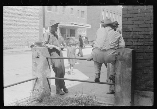 Farmers hang around in front of courthouse, on Saturday, Jackson, Kentucky
