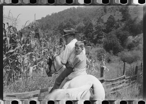 Untitled photo, possibly related to: Relatives and friends of the family of the deceased going home from a memeorial meeting in the mountains near Jackson, Kentucky. See general caption no. 1