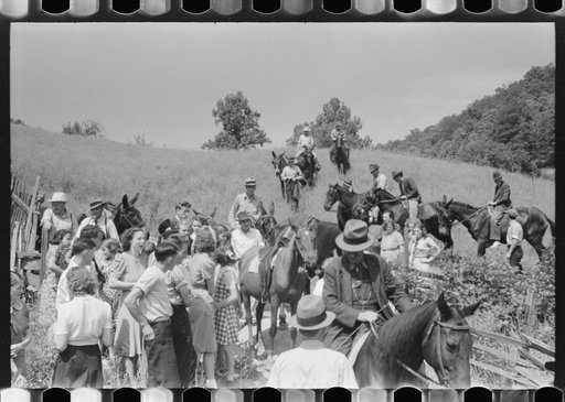 Relatives and friends of the family of the deceased going home from a memeorial meeting in the mountains near Jackson, Kentucky. See general caption no. 1