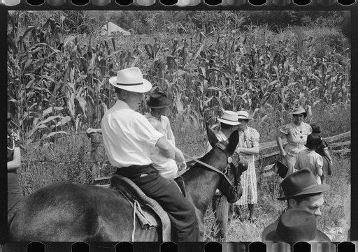 Untitled photo, possibly related to: Relatives and friends of the family of the deceased going home from a memeorial meeting in the mountains near Jackson, Kentucky. See general caption no. 1