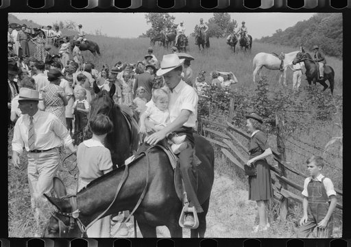 Relatives and friends of the family of the deceased going home from a memeorial meeting in the mountains near Jackson, Kentucky. See general caption no. 1