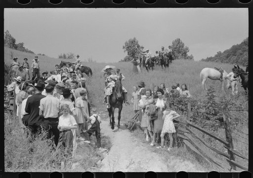 Relatives and friends of the family of the deceased going home from a memeorial meeting in the mountains near Jackson, Kentucky. See general caption no. 1
